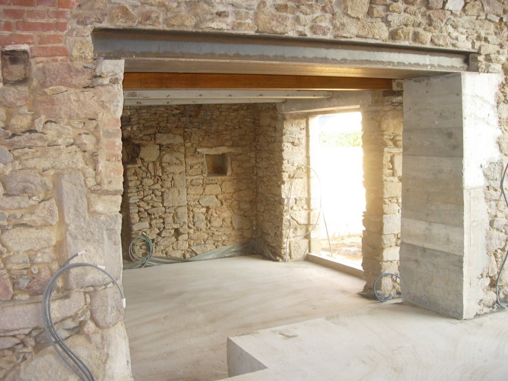 Ouverture de mur en pierre, en béton à Périgny